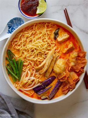  Laksa Penang: Ein cremiger Traum aus Kokosmilch und scharfen Gewürzen!